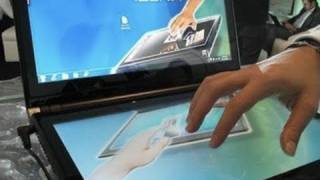 UNVEILED DualScreen Acer Iconia Laptop  CES 2011 [upl. by Alegnasor395]