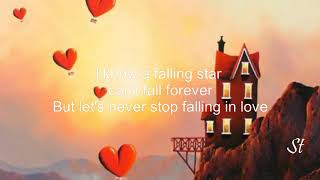 Pink Martini Lets Never Stop Falling in Love Lyrics [upl. by Barbaresi277]