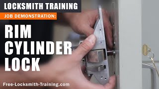 Replace Rim Cylinder  How to Install New Lock on Push Bar Exit Door  FreeLocksmithTrainingcom [upl. by Aleacim515]