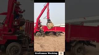 The Process Of Loading Stone Into A Truck With A Crane [upl. by Adiaz433]