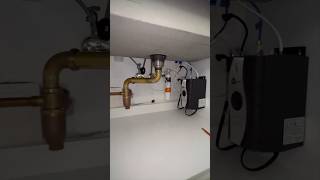 Instant hot water tank in kitchen installation hydronyc [upl. by Assirod]