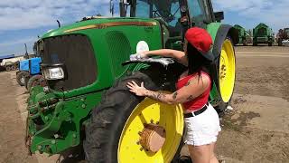 A BEAUTIFUL GIRL washes a tractor before work [upl. by Cleveland967]