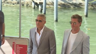 Stars Brad Pitt and George Clooney arrive at Venice Wolfs premiere  AFP [upl. by Snehpets474]