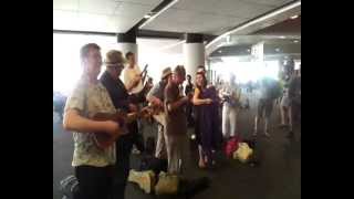 Ukelele Orchestra of Great Britain  Perth Airport WA  12032012avi [upl. by Strohbehn]