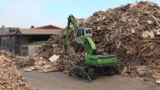 SENNEBOGEN  Timber Waste Handling 718 Mobile Timber machine with orange peel grab [upl. by Langelo]