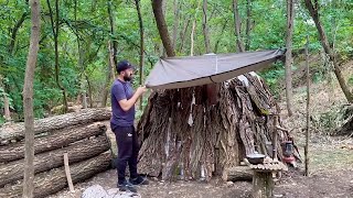 Build tent shelters out of plastic bags and bark [upl. by Aicat]