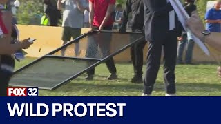 Protesters steal fencing from outside United Center [upl. by Ahsenra301]