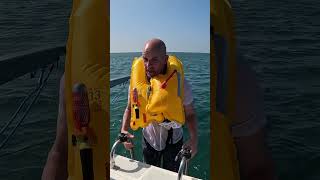 How do life jackets work when you fall overboard lifesavers lifehack boatlife [upl. by Notsek]