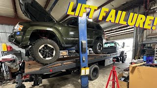 Shop’s Crazy Close Call Lift Cable SNAPPED Car Stuck on Rack [upl. by Lachlan]