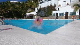 Jumps on pink air mattress in Hotel Altamar pool Puerto Rico Gran Canaria [upl. by Hirsh]