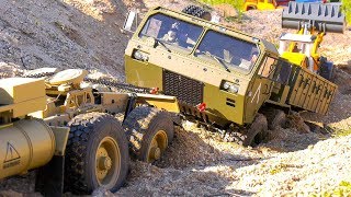 RC TRUCKS M983 HEMTT OSHKOSH 8x8 AMEWI PULL A RC WHEEL LOADER LIEBHERR FM ELECTRICS [upl. by Aittam853]