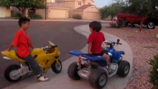 Motorcycle 4 year old on ATV 12 volts versus 7 year old on Motorcycle 36 volts [upl. by O'Malley]