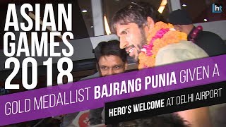 Gold medallist Bajrang Punia given a heros welcome at Delhi airport [upl. by Cutlerr421]