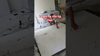 House construction in the philippines tiles fixing in the hall [upl. by Seditsira]