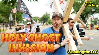 Street Preacher Carries MASSIVE Cross Though DC Parade [upl. by Kerek298]