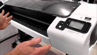 HP Designjet T1300 printer  how to load rolls of media [upl. by Adnuahsal]