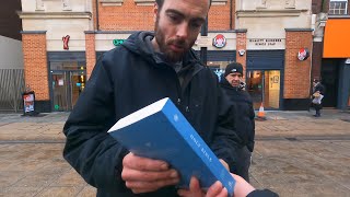 Man Takes A Free Bible In Romford [upl. by Ecirpak]