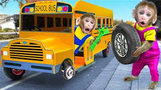 KiKi Monkey pretends to be a fake Car Mechanic fix School Bus Wheel on the road  KUDO ANIMAL KIKI [upl. by Nylitak]