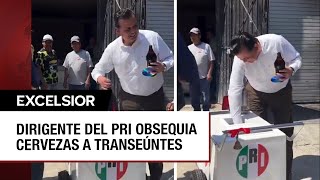 ¿Calor Dirigente priista en Michoacán sale a la calle a regalar caguamas [upl. by Helmer918]