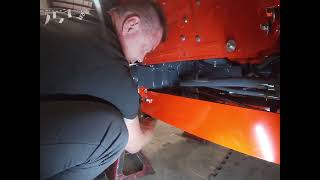 Attaching a backhoe subframe bracket on a Kubota L2502 [upl. by Ramos]