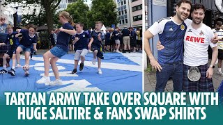 Tartan Army play football on huge Saltire and fans swap shirts in Cologne [upl. by Manchester701]