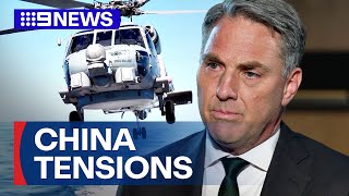 Chinese warplane fires flares in front of Australian helicopter  9 News Australia [upl. by Nomzaj]