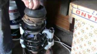 Replacing a front road spring on a Vectra B [upl. by Jake576]