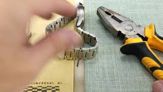 Remove watch strap with steel needle tool [upl. by Annatsirhc]