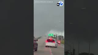 Tornado passes over highway in Fort Pierce Florida [upl. by Airdnaed]