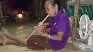 mro woman playing cultural flute [upl. by Nnilsia]