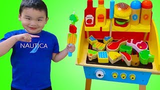 Lyndon Pretend Play Grilling on WOODEN BBQ Grill Cooking Toy [upl. by Anailli]