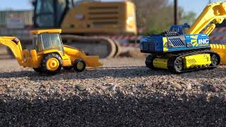 Construction toys  Hot wheels Matchbox and NORSCOT CAT 966G Wheel Loader at construction site￼ [upl. by Sadoff]