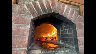 How to start a maintain a fire in a wood fire oven [upl. by Maibach]