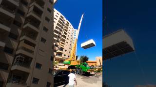 Crane Lifts Container House to New Heights [upl. by Nnylear391]