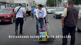 Reparando los baches de la Niño Artillero [upl. by Llerraf]