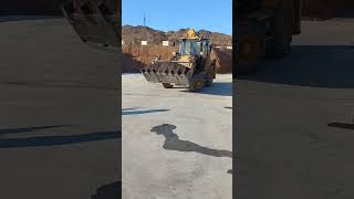 Flagman working with backhoe loader [upl. by Elletsirk]