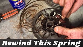 Honda Mower Engine Pull Cord Spring RepairRewind [upl. by Joann991]