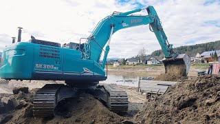 KOBELCO SK 300 NLC  Hochwasserschutzbau [upl. by Ahsienel]