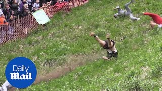 Competitors take on deathdefying Cheese Rolling Race [upl. by Marou839]