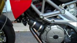 Aprilia Dorsoduro evaporative emissions canister removal [upl. by Keraj]