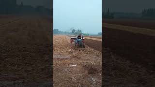 Spreading fertilizer on a tractor [upl. by Acisse]