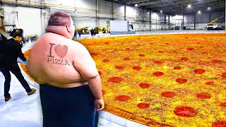 He eats worlds largest pizza in 10 seconds [upl. by Lyrrad693]