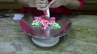 How to Pipe a Poinsettia  Cake Decorating [upl. by Naved]