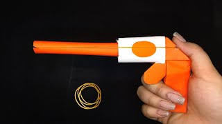 Origami colt gun  how to make paper gun that shoots rubber band [upl. by Bianka]