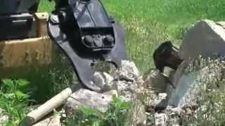 Triple S Skid Steer Attachment  Power Concrete Crusher [upl. by Iveksarap807]