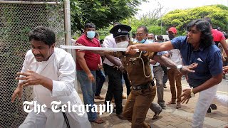 Sri Lankas prime minister resigns amid violent clashes in Colombo [upl. by Swamy]