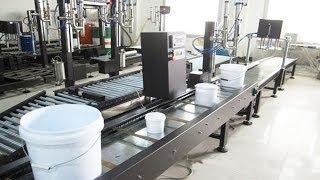 10kg automatic big lids buckets weighing filling caps falling press capping machinery automated line [upl. by Magnusson876]