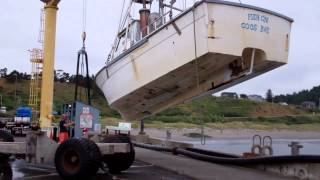 Port Orford OR boat hoist operations [upl. by Yrocej467]