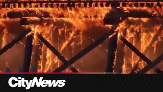 Large fire engulfs inactive rail trestle between Richmond and Vancouver [upl. by Anaderol]