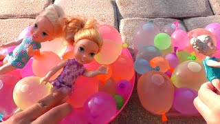 Water balloons Elsa amp Anna toddlers  pool  water fun  floaties [upl. by Venable]